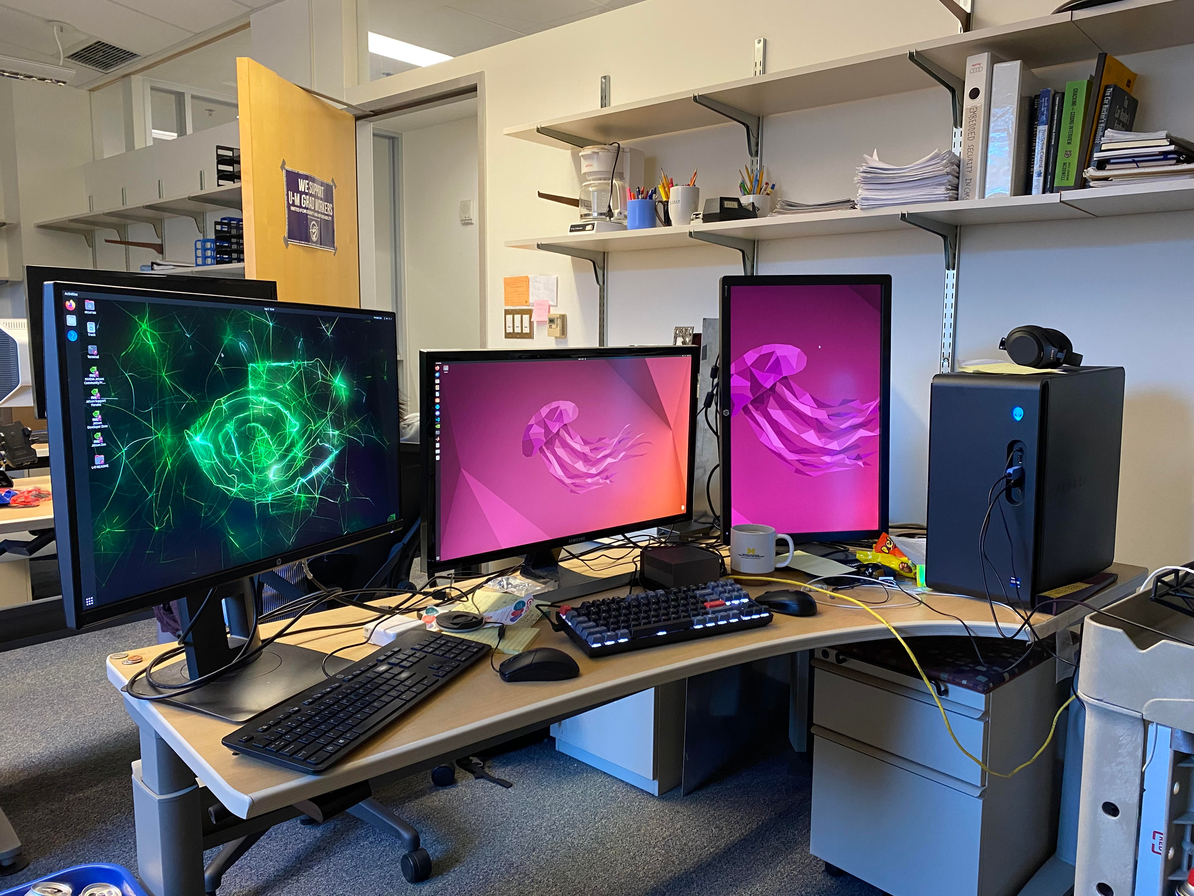 The setup of two computers. One is running an Nvidia Orin NX on the left and one is running Ubuntu 22.04 workstation on the right. The two computers are connected via an ethernet cord.